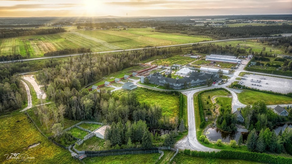 Cedar Meadows Spa & Resort An aerial view of the Cedar Meadows Resort & Spa, showcasing the beautiful countryside. - Timmins, Ontario