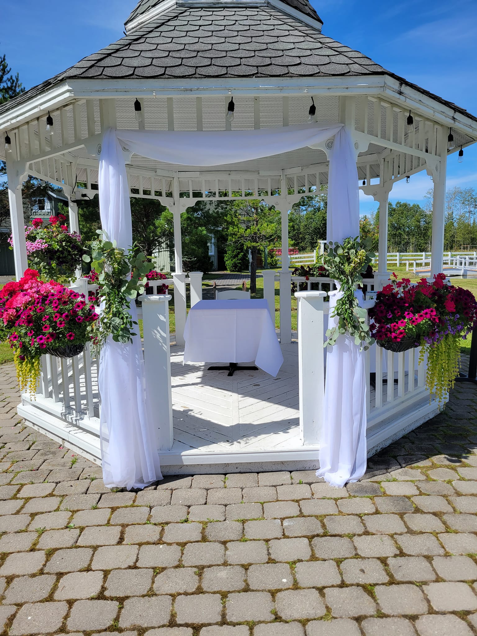 Cedar Meadows Spa & Resort A gazebo with flowers on it at Cedar Meadows Resort & Spa, Timmins Ontario. - Timmins, Ontario